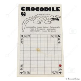 "Crocodile - Reunite the families in this adventurous vintage game!"