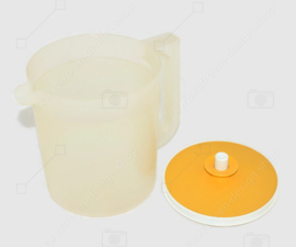 Vintage transparante Tupperware schenkkan met geel afsluitdeksel, laag model