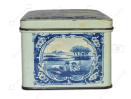 Rectangular vintage tin with hinged lid, decorated in blue and white, depiction: Dutch meadow landscapes