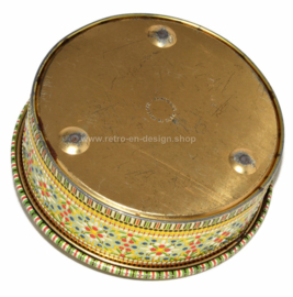 Round vintage cookie tin executed with beaded pattern