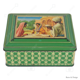 Lata rectangular verde, "té Assam", té indio bebiendo damas en la tapa