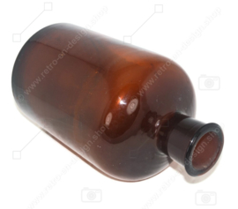 Hermosa botella de boticario en vidrio marrón oscuro