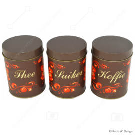 Set of three storage tins for coffee, tea, and sugar in original packaging