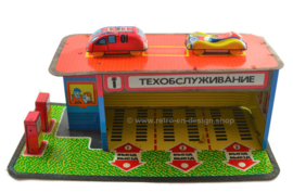 Old vintage Russian tin toy garage with cars