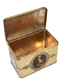 Vintage tin with images of old master paintings