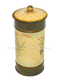 Cylindrical tin for cookies or biscuits made by Victoria decorated with flower pattern