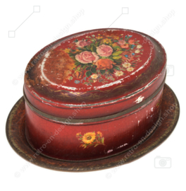 Oval vintage antique dark red candy tin with flower decoration and saucer