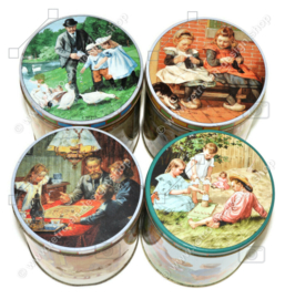 Series of four seasonal tins made by Jamin with images of Ot and Sien by C. Jetses