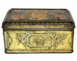Vintage tin La Biscuiterie Nantaise with a young girl and roses on the lid