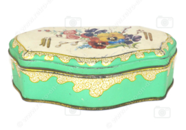 Scalloped green vintage tea tin by DE GRUYTER with floral decoration