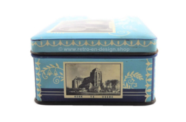 Blauw vintage blik met foto's van zeeland