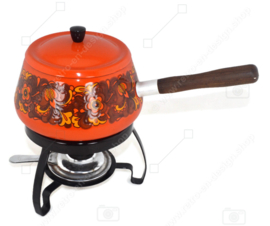 Vintage enamel orange fondue set made by Brabantia with floral pattern and wooden handle