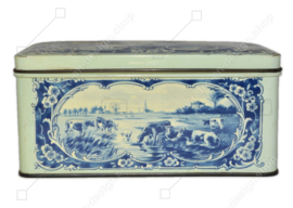 Rectangular vintage tin with hinged lid, decorated in blue and white, depiction: Dutch meadow landscapes