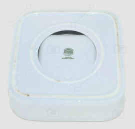 White glazed earthenware ashtray with two slots, made in Western Germany