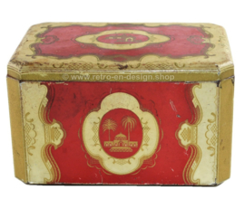 Boîte éain orientale vintage rouge avec des détails dorés
