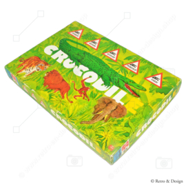 "Crocodile - Reunite the families in this adventurous vintage game!"