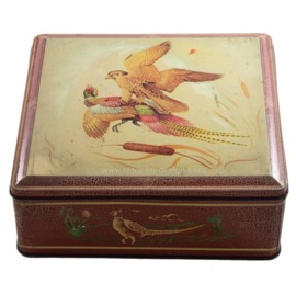 Vintage blikken trommel voor Van Melle met voorstelling van roofvogel en fazant