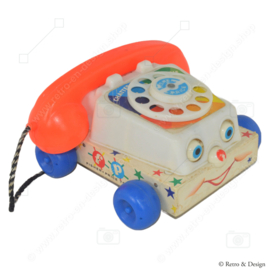 De originele vintage Fisher-Price "Chatter" Speelgoedtelefoon uit 1961