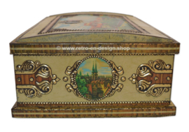 Large vintage tin with medieval cityscape and coat of arms