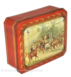 Vintage tin for biscuits by Albert Heijn with an image of a carriage and horses