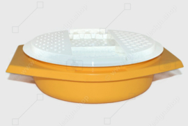 Vintage Tupperware slicing bowl in yellow with white grater and transparent lid