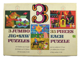 Box containing three vintage Jumbo jigsaw puzzles