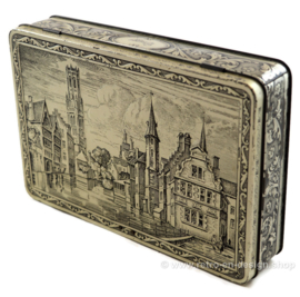 Vintage blik G.B.C. Belgium met de stad Brugge in reliëf