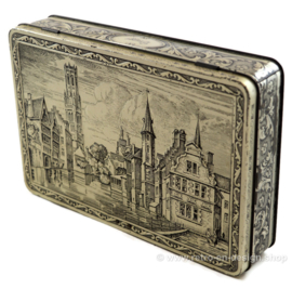 Vintage tin by G.B.C. Belgium with the city of Bruges embossed on lid