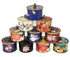 Vintage tin canister with knob and floral decor of daffodils, lily and butterfly by Côte d'Or