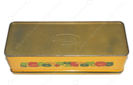 Lata rectangular con tapa con bisagras producida por Verkade para "Pan de jengibre con miel", amarillo oscuro y multicolor