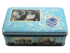 Blauw vintage blik met foto's van zeeland