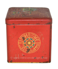 Vintage tin cube for tea by Van Nelle with an image of an Oriental lion