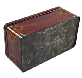 Old brocante tin box with stylized floral pattern