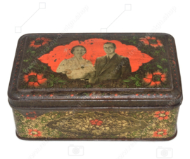 Vintage tin with an image of Princess Juliana and Prince Bernhard in relief