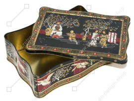 Vintage tea tin in black, gold and red with oriental images
