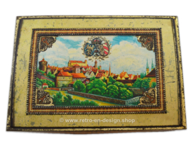 Large vintage tin with medieval cityscape and coat of arms