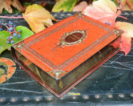 Book simulant or book-shaped tin with orange leather imitation, Gourmets Delight for VICTORIA