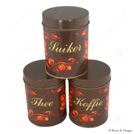 Set of three storage tins for coffee, tea, and sugar in original packaging