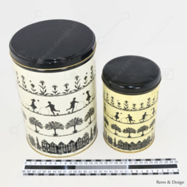 Vintage set of Tomado tins with old Dutch scenes in black, cream
