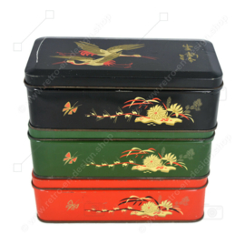 Vintage tea tins made by DE GRUYTER with oriental bird decor in green, red and black