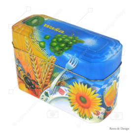 Caja de lata naranja con azul para Crackers de Wasa con imagen de gallo, abeja, girasol, cereal y fruta