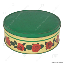 Ronde vintage koektrommel met rozendecoratie en groen deksel