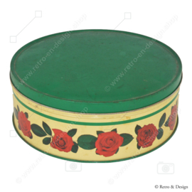 Round vintage biscuit tin with rose decoration and green lid