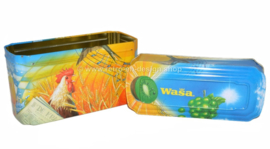 Orange and blue tin box for Wasa Crackers with images of a rooster, bee, sunflower, grain and fruit