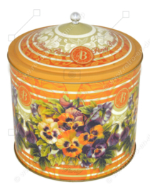 Colourful Italian storage tin for Pandoro cake, with images of violets