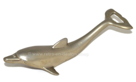 Vintage flesopener in de vorm van een dolfijn