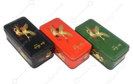Vintage tea tins made by DE GRUYTER with oriental bird decor in green, red and black