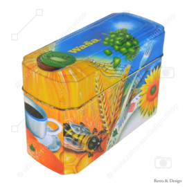 Caja de lata naranja con azul para Crackers de Wasa con imagen de gallo, abeja, girasol, cereal y fruta