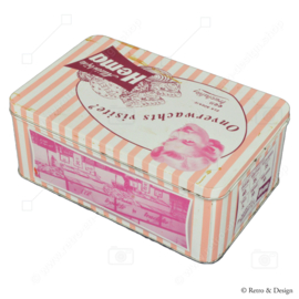 Boîte rétro rose pour biscuits par Hema avec des photos de l'intérieur de la boutique