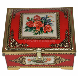 Red vintage tin candy box with rose decoration